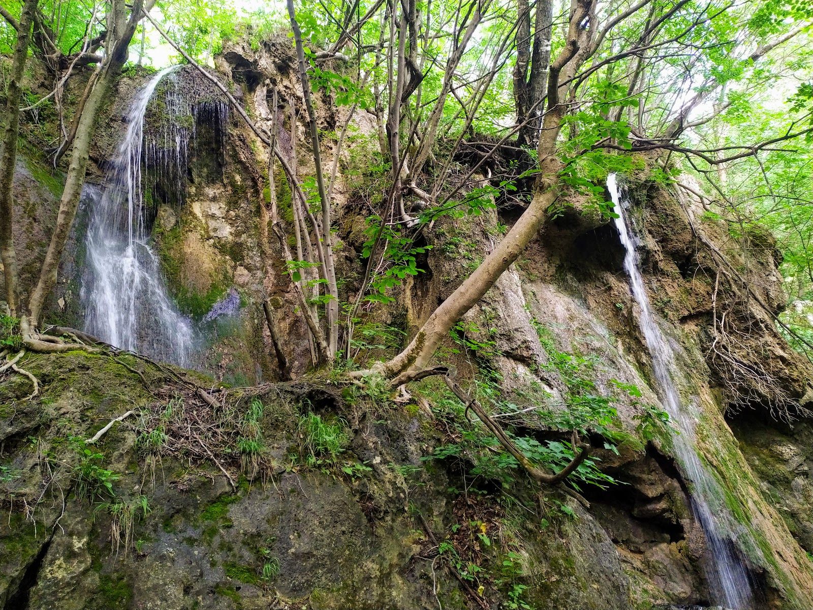 Waterfall and a cave "Futula"